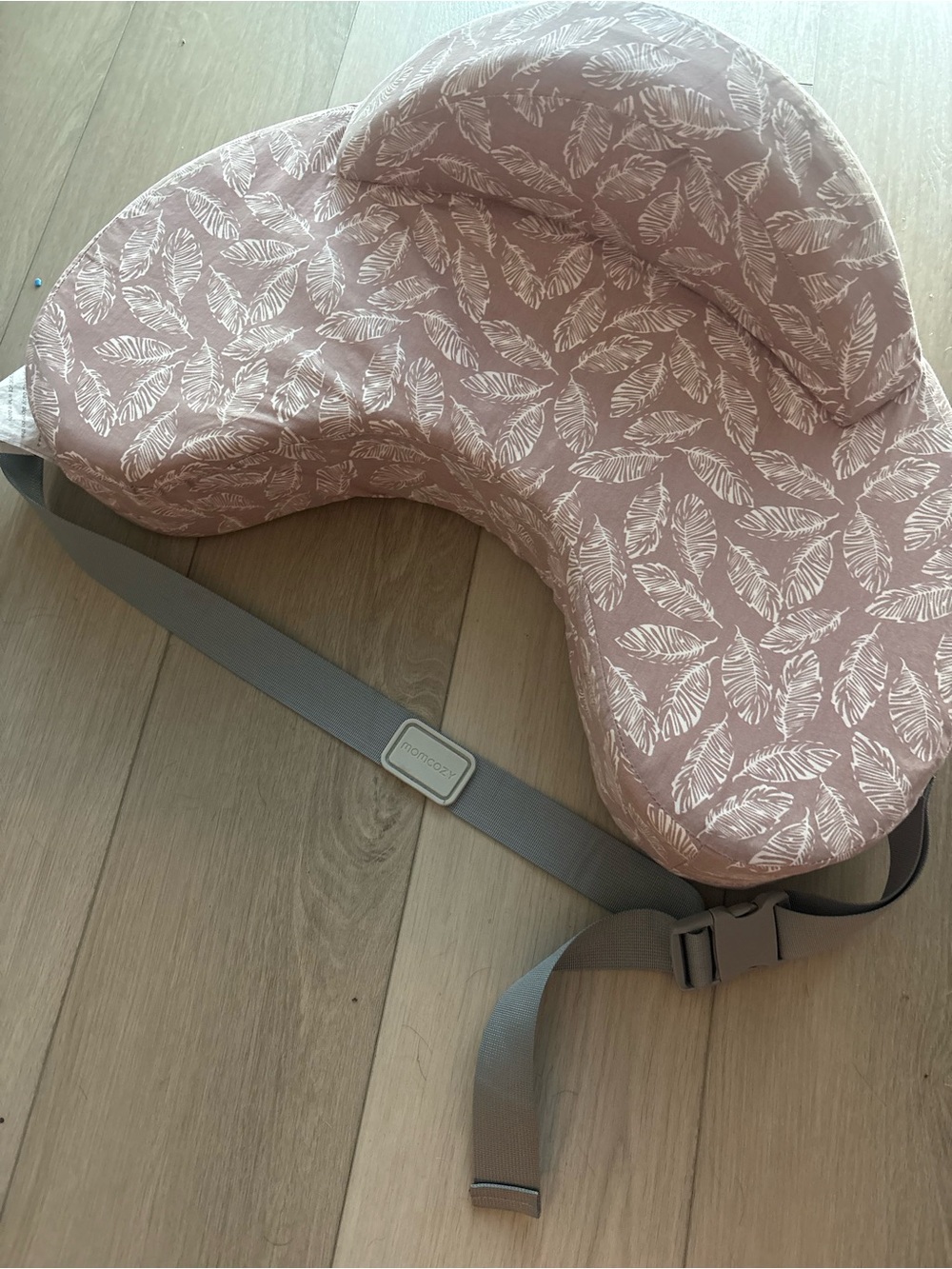 Momcozy original nursing pillow with strap in Blush Pink with Feather Print